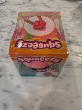 Never Opened Peach Squeezy Squishy-